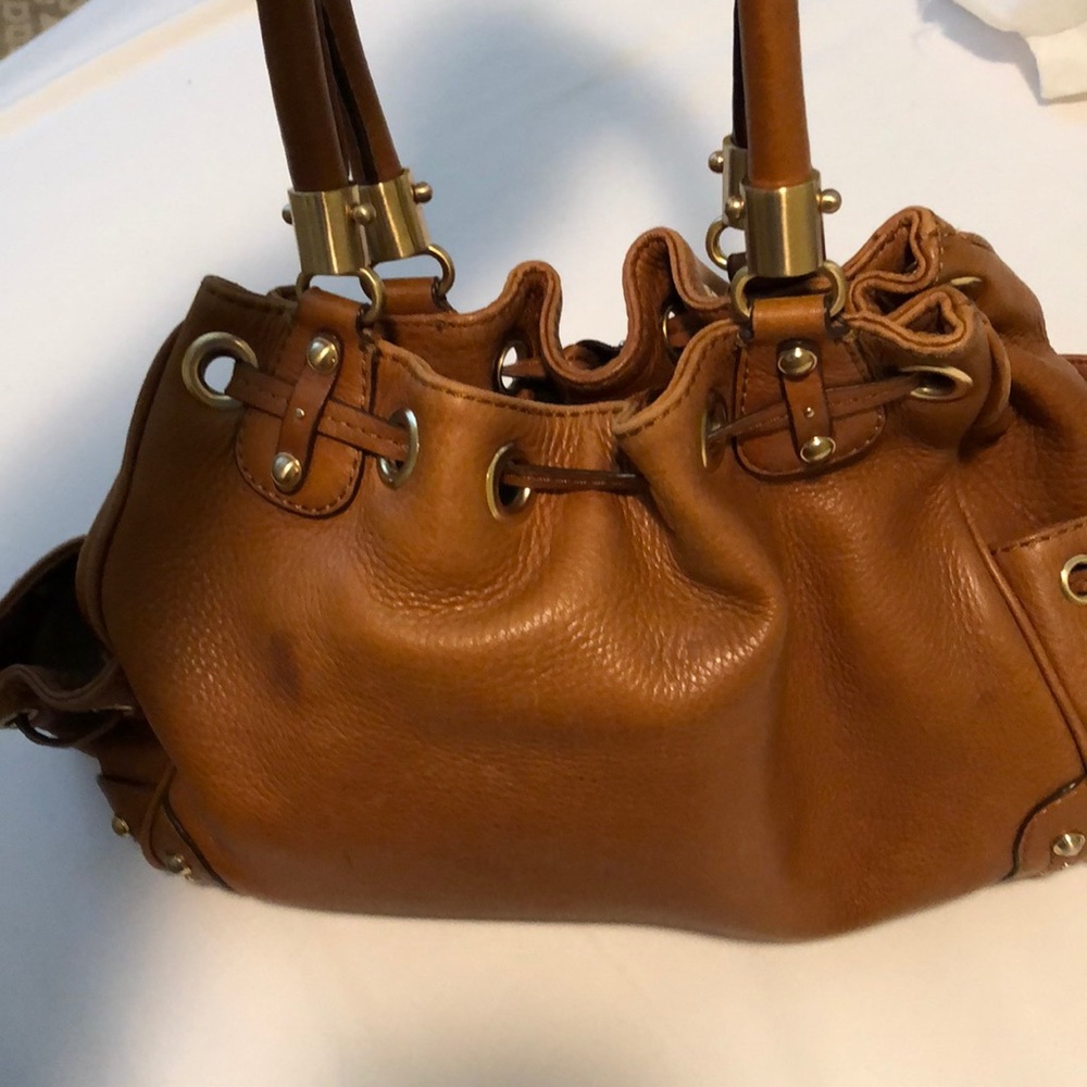 Michael Kors saddle tan leather handbag drawstring